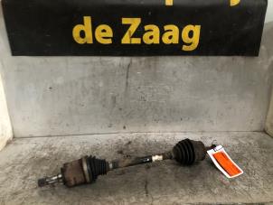 Used Front drive shaft, left Opel Corsa E 1.4 16V Price € 35,00 Margin scheme offered by Autodemontage de Zaag
