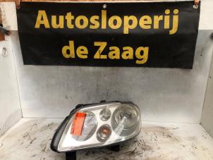 Used Headlight, left Volkswagen Touran (1T1/T2) 2.0 FSI 16V Price on request offered by Autodemontage de Zaag
