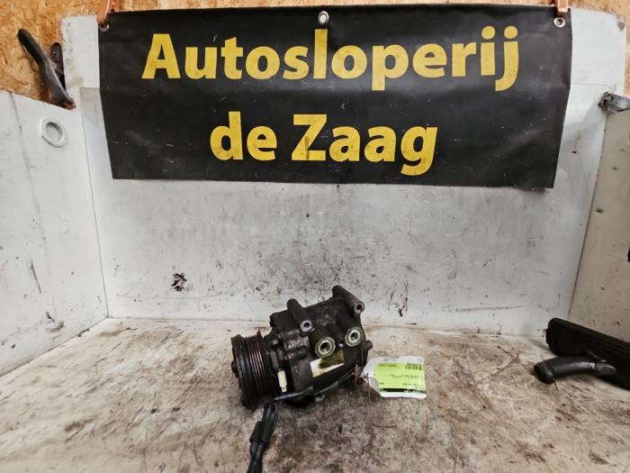 Usagé Compresseur de clim Ford Focus 1 1.6 16V Prix € 70,00 Règlement à la marge proposé par Autodemontage de Zaag