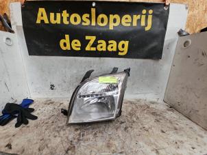 Used Headlight, left Ford Fusion 1.6 16V Price € 45,00 Margin scheme offered by Autodemontage de Zaag