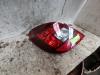 Taillight, left from a Opel Corsa D 1.2 16V 2012