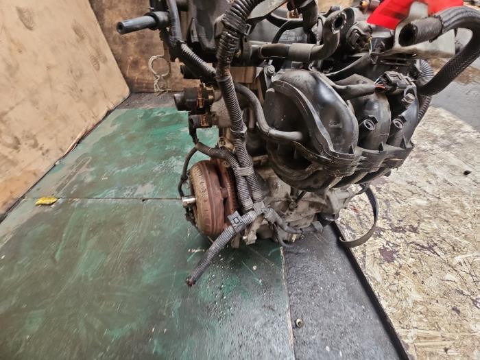Engine from a Daihatsu Cuore (L251/271/276) 1.0 12V DVVT 2008