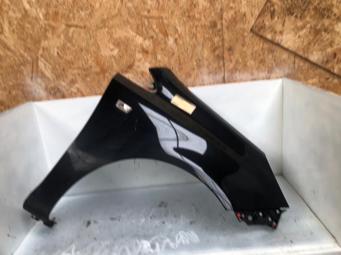 Front wing, right from a Opel Corsa D 1.4 16V Twinport 2008