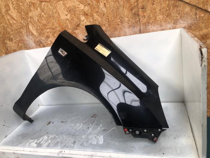 Front wing, right from a Opel Corsa D 1.4 16V Twinport 2008