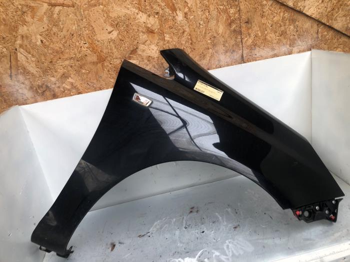 Front wing, right from a Opel Corsa D 1.4 16V Twinport 2008