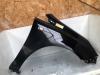 Front wing, right from a Opel Corsa D 1.4 16V Twinport 2008