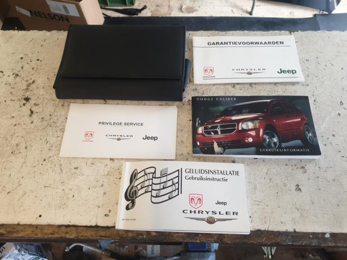 Używane Instrukcja Dodge Caliber 1.8 16V Cena € 25,00 Procedura marży oferowane przez Autodemontage de Zaag
