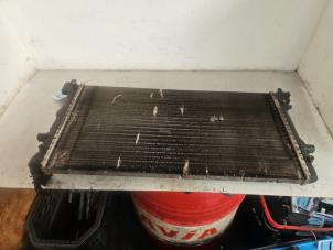 Radiator from a Seat Ibiza IV (6J5) 1.2 12V 2009