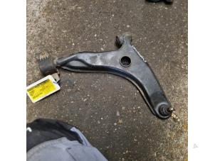 Used Front wishbone, right Mitsubishi Carisma 1.6i 16V Price on request offered by Autodemontage de Zaag