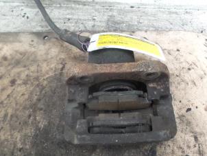 Used Front brake calliper, left Renault Clio II (BB/CB) 1.6 16V Price € 15,00 Margin scheme offered by Autodemontage de Zaag