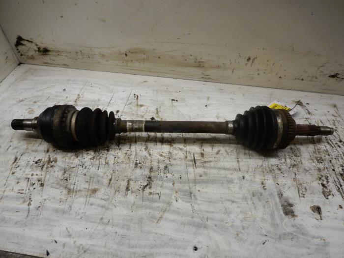 Front drive shaft, left from a Daewoo Aveo (250) 1.2 16V 2009