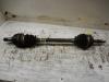 Front drive shaft, left from a Daewoo Aveo (250) 1.2 16V 2009
