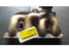 Exhaust manifold from a Peugeot 206 CC (2D) 2.0 16V 2004