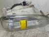 Headlight, right from a Volkswagen Golf III (1H1) 1.4 CL 1994