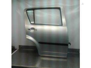 Usagé Porte arrière droite Daihatsu Sirion 2 (M3) 1.0 12V DVVT Prix € 74,99 Règlement à la marge proposé par Japoto Parts B.V.