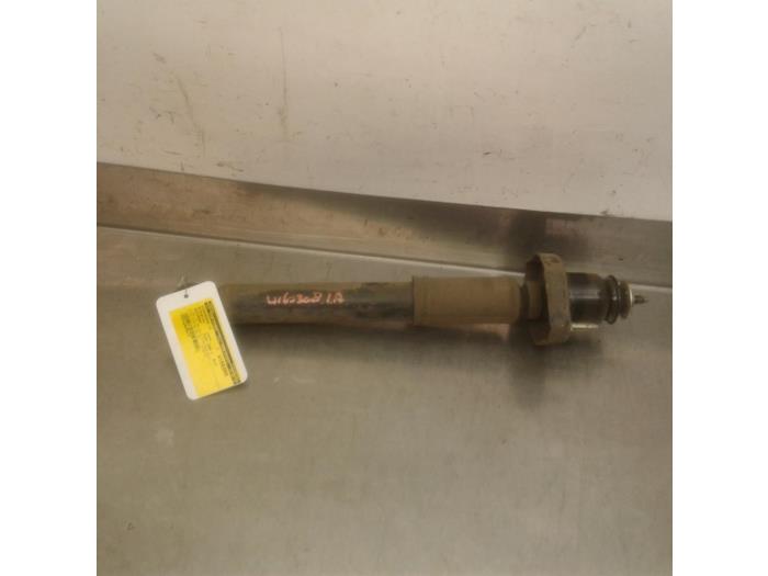 Rear shock absorber, left from a Mitsubishi Outlander (CW) 2.2 DI-D 16V 4x4 2009