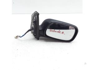 Used Wing mirror, right Toyota Prius (NHW11L) 1.5 16V Price € 49,95 Margin scheme offered by Japoto Parts B.V.