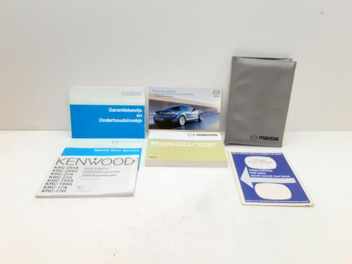 Używane Instrukcja Mazda 323 (BJ12) 1.6 16V Cena € 10,45 Procedura marży oferowane przez Japoto Parts B.V.