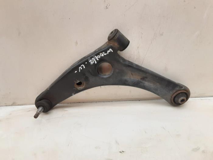 Front lower wishbone, left from a Mitsubishi Colt 2008