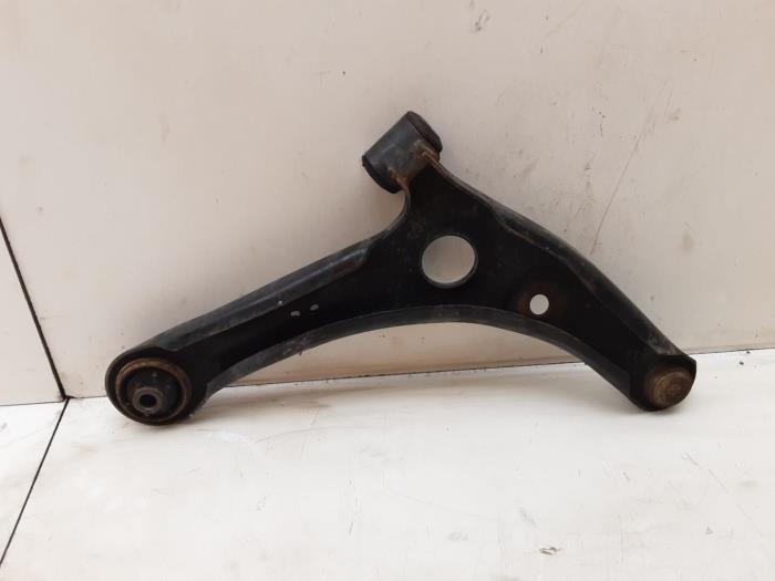 Front lower wishbone, left from a Mitsubishi Colt 2008
