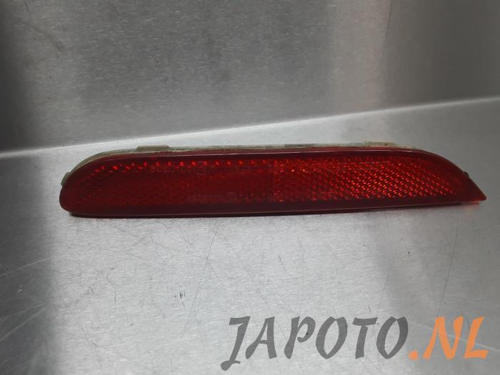 Rear bumper reflector, right from a Nissan Qashqai (J11) 1.6 dCi All Mode 4x4-i 2014