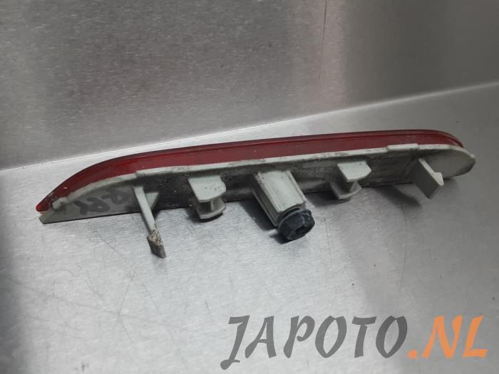 Rear bumper reflector, right from a Nissan Qashqai (J11) 1.6 dCi All Mode 4x4-i 2014