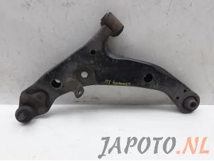 Used Front lower wishbone, left Toyota Corolla (EB/WZ/CD) 1.6 16V VVT-i Price € 29,00 Margin scheme offered by Japoto Parts B.V.