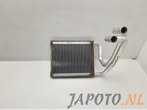 Usados Radiador de calefactor Kia Cee'd Sporty Wagon (EDF) 1.4 CVVT 16V Precio € 34,99 Norma de margen ofrecido por Japoto Parts B.V.