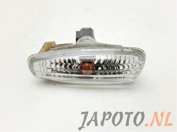 Indicator lens, front left from a Kia Cee'd Sporty Wagon (EDF) 1.4 CVVT 16V 2011
