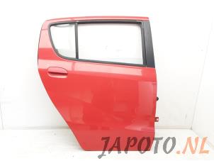 Usagé Porte arrière droite Daihatsu Cuore (L251/271/276) 1.0 12V DVVT Prix € 99,95 Règlement à la marge proposé par Japoto Parts B.V.