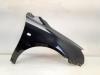 Front wing, right from a Toyota Avensis Wagon (T25/B1E) 1.8 16V VVT-i 2005