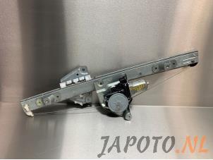 Usagé Mécanique vitre 4portes arrière gauche Suzuki Grand Vitara II (JT) 2.0 16V Prix € 39,95 Règlement à la marge proposé par Japoto Parts B.V.