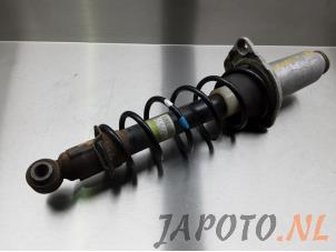 Używane Stopa amortyzatora prawy tyl Mazda MX-5 (NC18/1A) 1.8i 16V Cena € 39,00 Procedura marży oferowane przez Japoto Parts B.V.