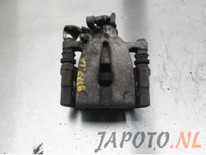 Used Rear brake calliper, left Kia Venga 1.6 CVVT 16V Price € 39,95 Margin scheme offered by Japoto Parts B.V.