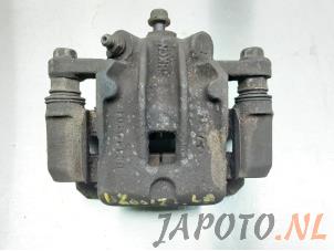 Used Rear brake calliper, left Hyundai i20 1.2i 16V Price € 50,00 Margin scheme offered by Japoto Parts B.V.