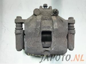 Used Front brake calliper, left Hyundai i20 1.2i 16V Price € 30,00 Margin scheme offered by Japoto Parts B.V.