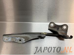 Usagé Charnière de capot Daihatsu Cuore (L251/271/276) 1.0 12V DVVT Prix € 9,95 Règlement à la marge proposé par Japoto Parts B.V.