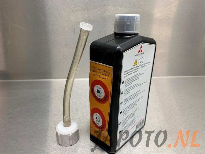 Tyre repair kit from a Mitsubishi Colt (Z2/Z3) 1.3 16V 2005