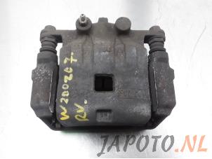Used Front brake calliper, right Mazda 2 (DE) 1.3 16V S-VT Price € 34,95 Margin scheme offered by Japoto Parts B.V.
