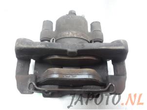 Used Front brake calliper, right Toyota Yaris III (P13) 1.33 16V Dual VVT-I Price € 39,95 Margin scheme offered by Japoto Parts B.V.