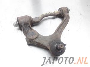 Used Front upper wishbone, left Toyota HiAce II 2.4 TD Price € 49,95 Margin scheme offered by Japoto Parts B.V.