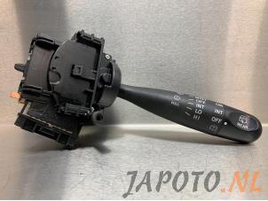 Używane Przelacznik wycieraczki Daihatsu Cuore (L251/271/276) 1.0 12V DVVT Cena € 24,95 Procedura marży oferowane przez Japoto Parts B.V.