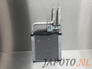 Used Air conditioning vaporiser Nissan Note (E11) 1.4 16V Price € 29,95 Margin scheme offered by Japoto Parts B.V.