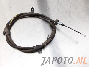 Used Parking brake cable Kia Sportage (SL) 1.6 GDI 16V 4x2 Price € 24,95 Margin scheme offered by Japoto Parts B.V.