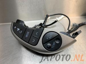 Used Steering wheel mounted radio control Toyota Prius (NHW20) 1.5 16V Price € 39,95 Margin scheme offered by Japoto Parts B.V.