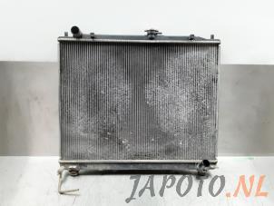 Usagé Radiateur Mitsubishi Pajero Canvas Top (V6/7) 3.2 DI-D 16V Prix € 40,00 Règlement à la marge proposé par Japoto Parts B.V.