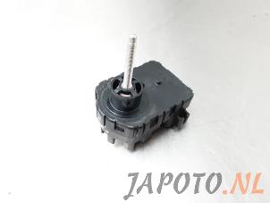 Used Headlight motor Mazda CX-7 2.3 MZR DISI Turbo 16V Price € 24,95 Margin scheme offered by Japoto Parts B.V.