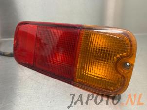 Used Rear fog light Suzuki Grand Vitara I (FT/GT/HT) 2.5 V6 24V Price € 49,95 Margin scheme offered by Japoto Parts B.V.
