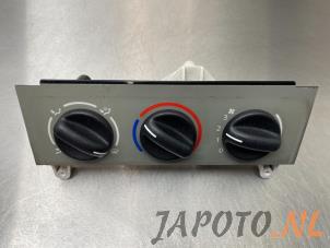 Usados Panel de control de calefacción Nissan Kubistar (F10) 1.5 dCi 70 Precio € 34,95 Norma de margen ofrecido por Japoto Parts B.V.