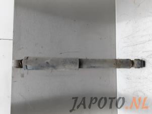 Usagé Amortisseur arrière gauche Daihatsu Terios (J1) 1.3 16V DVVT 4x2 Prix € 14,99 Règlement à la marge proposé par Japoto Parts B.V.